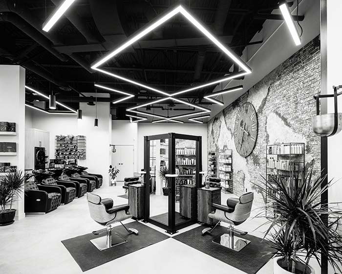 sin7-abbotsford-02 Image depicting stylist and clients in Salon.